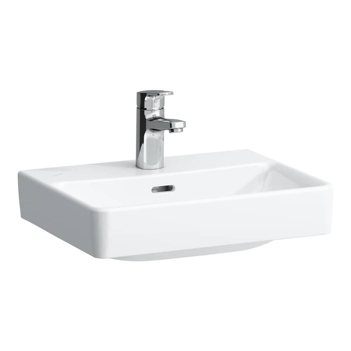Small white wall-mounted sink