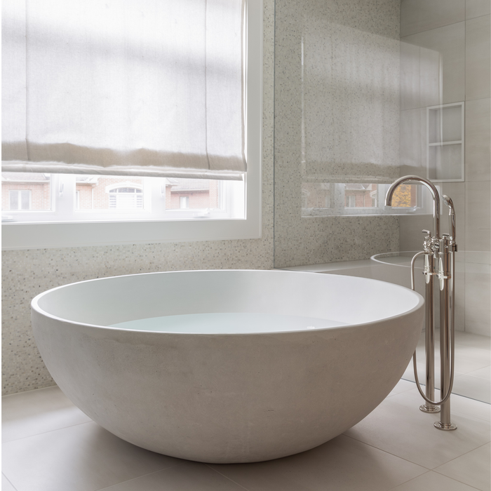 KOPA freestanding circular concrete bath