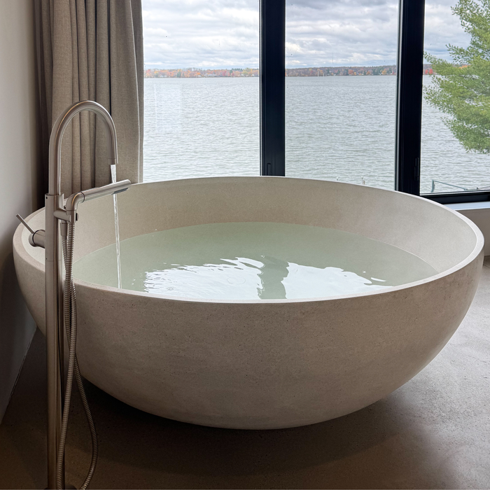 KOPA freestanding circular concrete bath